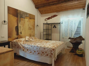 La casa sul tetto, Room's & Glamping